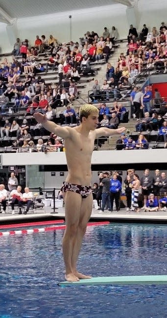 Bloomington North's Max Miller gets ready to do his last dive at the IHSAA boys' state swimming championships at the IU Natatorium in Indianapolis on Saturday, Feb. 25, 2023.
