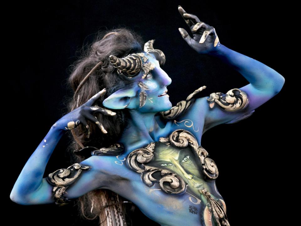 Nude models pose for world bodypainting festival