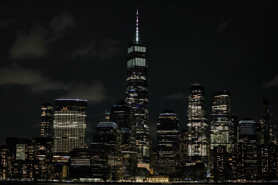 Night view of New York city's lower Manhattan skyline, with the One World Trade Center skyscraper (center left), seen from Jersey City on Jan. 20, 2024. New York City ranks as the No. 1 noisiest U.S. cities.