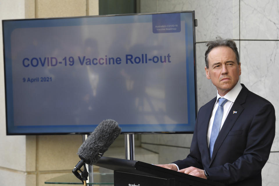 Australia's Health Minister Greg Hunt discusses the COVID-19 vaccination program at a press conference at Parliament House in Canberra, Friday, April 9, 2021. The Australian government has decided, Tuesday, April 13, 2021, against buying the single-dose Johnson & Johnson coronavirus vaccine as a way to accelerate its immunization program. (Mick Tsikas/AAP Image via AP)