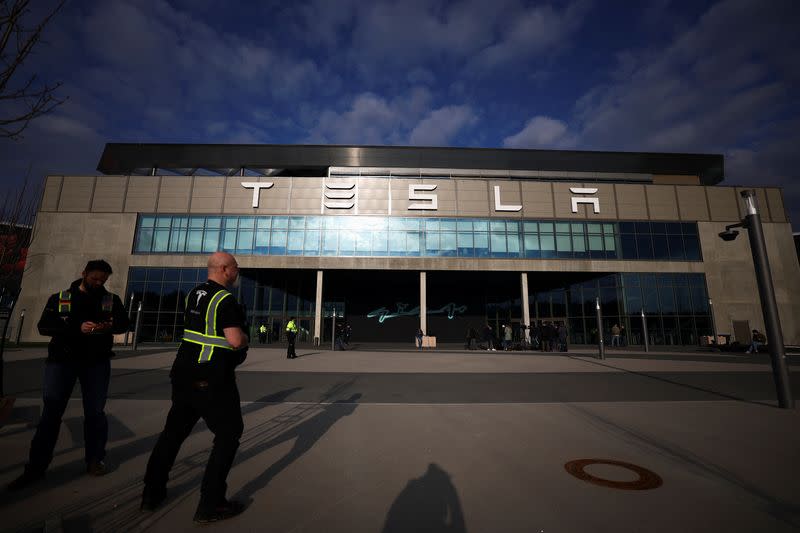 Tesla's Gigafactory halts its production after a suspected arson attack, in Gruenheide