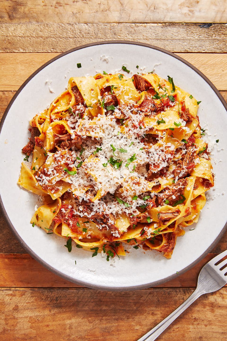 <p>This easy and delicious ragu is perfect for date night. Don't skimp on the parm!</p><p>Get the recipe from <a href="https://www.delish.com/cooking/recipe-ideas/a28848480/beef-ragu-recipe/" rel="nofollow noopener" target="_blank" data-ylk="slk:Delish;elm:context_link;itc:0;sec:content-canvas" class="link ">Delish</a>.</p>