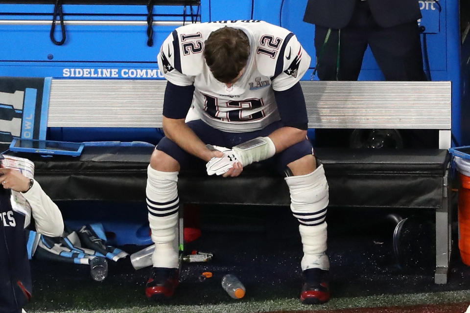 Patriots Quarterback Tom Brady sits on the bench after having the ball stripped by Brandon Graham of the Philadelphia Eagles. (Photo: Christian Petersen via Getty Images)