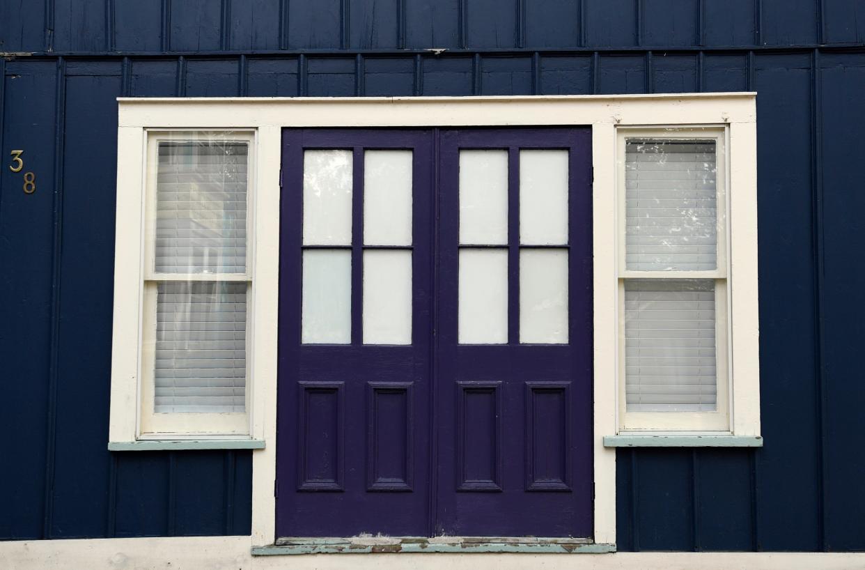 Painting your front door a fun color is a good way to add curb appeal to your home.