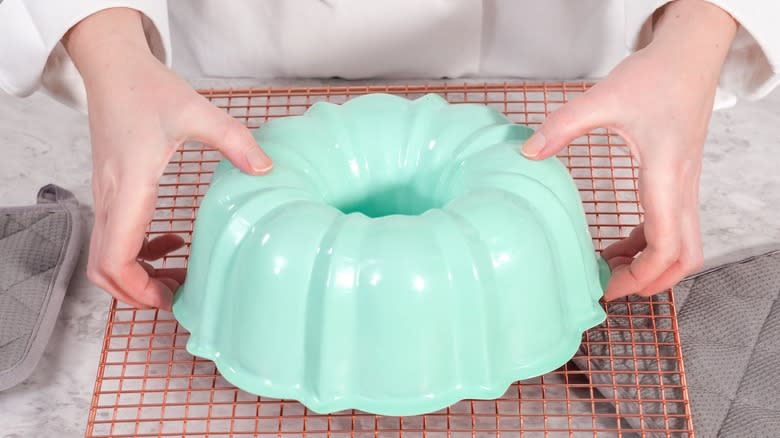 Flipping blue bundt pan