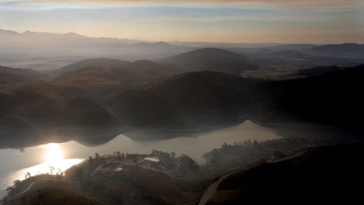 Santa Ana Winds Stoke Wildfires At Lake Hodges In Southern California