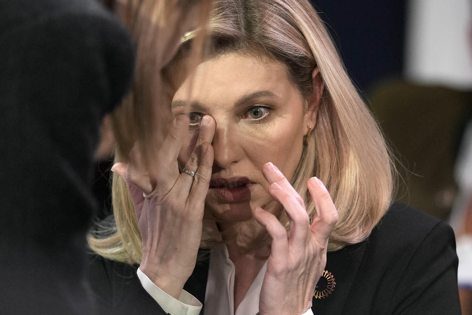 First Lady of Ukraine Olena Zelenska reacts at the World Economic Forum in Davos, Switzerland after the news of a helicopter crash in Ukraine, where Minister of Internal Affairs Denys Monastyrsky died among others on Wednesday, Jan. 18, 2023. The annual meeting of the World Economic Forum is taking place in Davos from Jan. 16 until Jan. 20, 2023. (AP Photo/Markus Schreiber)