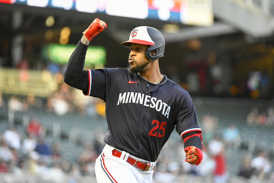 Minnesota Twins designated hitter Byron Buxton celebrates after hitting a two-run home run, the 100th home run of his career, during the first inning of the team's baseball game against the Chicago White Sox, Tuesday, April 11, 2023, in Minneapolis. (AP Photo/Craig Lassig)