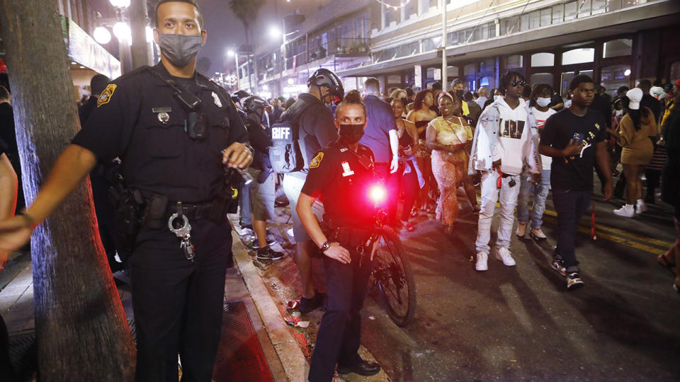 Tampa Police officers, pictured here monitoring large crowds gather in the Ybor City district.