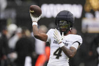 Colorado wide receiver Omarion Miller warms up before an NCAA spring college football game Saturday, April 27, 2024, in Boulder, Colo. (AP Photo/David Zalubowski)