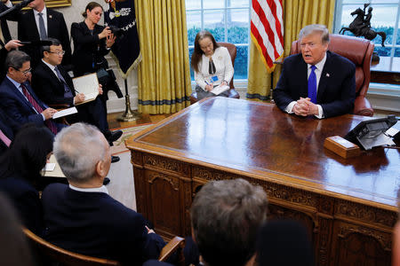 U.S. President Donald Trump meets with Chinese Vice Premier Liu He in the Oval Office at the White House in Washington, U.S., February 22, 2019. REUTERS/Carlos Barria