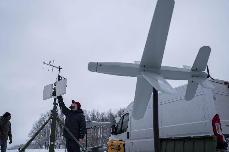 An engineer assembles an antenna for guiding an exploding drone in Kyiv region, Ukraine, on Saturday, February 10, 2024. (AP Photo/Evgeniy Maloletka)