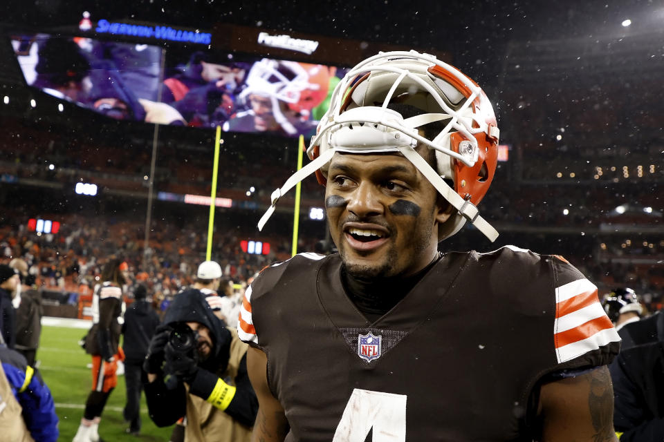 FILE - Cleveland Browns quarterback Deshaun Watson (4) walks off of the field after an NFL football game against the Baltimore Ravens on Saturday, Dec. 17, 2022, in Cleveland. Hardly a day passed in 2022 when a headline running across the ticker on ESPN would have been fitting on CNN or Fox Business. The intersection between sports and real life ranged from toxic workplace environments, alleged sexual misconduct, sportswashing, cryptocurrency, transgender sports and the COVID-19 pandemic. (AP Photo/Kirk Irwin, File)