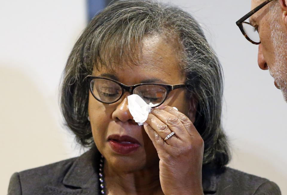 Anita Hill wipes her eye after speaking at the University of Utah on Wednesday, Sept. 26, 2018, in Salt Lake City. Hill has been back in the spotlight since Christine Blasey Ford accused Supreme Court nominee Brett Kavanaugh of sexually assaulting her when the two were in high school. Hill's 1991 testimony against Clarence Thomas riveted the nation. Thomas was confirmed anyway, but the hearing ushered in a new awareness of sexual harassment. (AP Photo/Rick Bowmer)