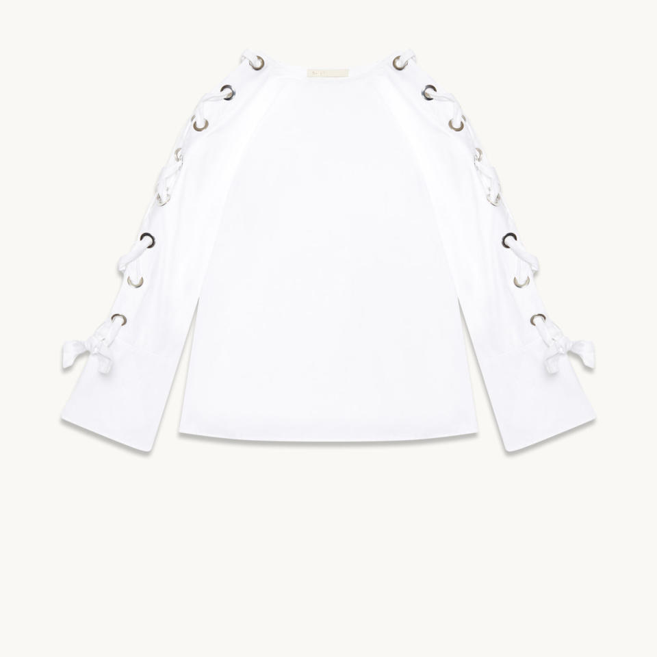 <p>Maje Cotton Poplin Top with Eyelets, $250; <a rel="nofollow noopener" href="http://us.maje.com/en/categories/tops-and-t-shirts/leno/E17LENO.html?dwvar_E17LENO_color=0501#start=13" target="_blank" data-ylk="slk:us.maje.com;elm:context_link;itc:0;sec:content-canvas" class="link ">us.maje.com</a> </p>