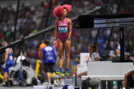 Taliyah Brooks, of the United States, limbers-up as she prepares to compete in the heptathlon high jump during the World Athletics Championships in Budapest, Hungary, Saturday, Aug. 19, 2023. (AP Photo/Petr David Josek)