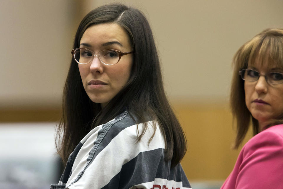 FILE - In this April 13, 2015, file photo, Jodi Arias, left, looks on next to her attorney, Jennifer Willmott, during her sentencing in Maricopa County Superior Court in Phoenix. The Arizona Supreme Court is scheduled to rule Thursday, April 30, 2020, in an ethics case against a prosecutor for his conduct in the Jodi Arias trial and other cases. The State Bar of Arizona, which alleged Martinez had shown a pervasive pattern of misconduct, asked the court to reverse a disciplinary panel's finding favorable to Juan Martinez. (Mark Henle/The Arizona Republic via AP, Pool, File)