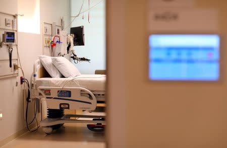 FILE PHOTO: An electronic patients chart is shown on the wall to a hospital room at the newly constructed Kaiser Permanente San Diego Medical Center hospital in San Diego, California April 17, 2017. REUTERS/Mike Blake