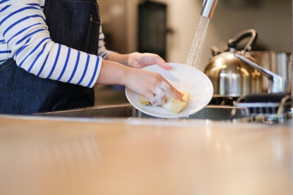 Person washing dishes