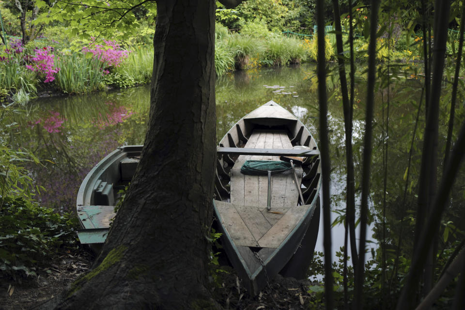 The Japanese-inspired water garden of Claude Monet's house, French impressionist painter who lived from 1883 to 1926, waits ahead of the re-opening, in Giverny, west of Paris, Monday May 17, 2021. Lucky visitors who'll be allowed back into Claude Monet's house and gardens for the first time in over six months from Wednesday will be treated to a riot of color, with tulips, peonies, forget-me-nots and an array of other flowers all competing for attention. (AP Photo/Francois Mori)