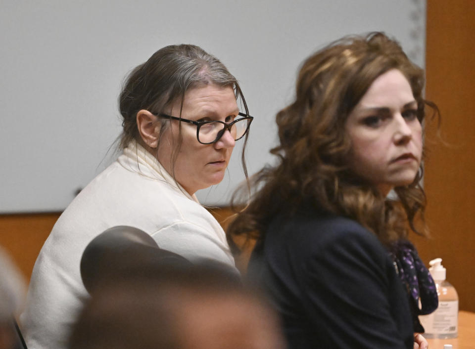 Defendant Jennifer Crumbley, left, and her attorney Shannon Smith react to the unanimous verdict of guilty of involuntary manslaughter on all counts at the conclusion of her trial in the courtroom of Judge Cheryl Matthews at Oakland County Circuit Court in Pontiac, Mich., on Tuesday, Feb. 6, 2024. (Daniel Mears/Detroit News via AP)