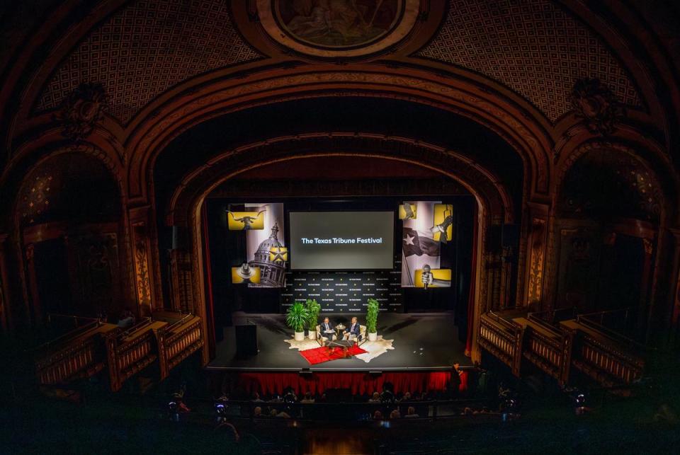 Smith speaks Manchin in the closing keynote at the Paramount Theatre on Saturday. <cite>Credit: Julius Shieh/The Texas Tribune</cite>