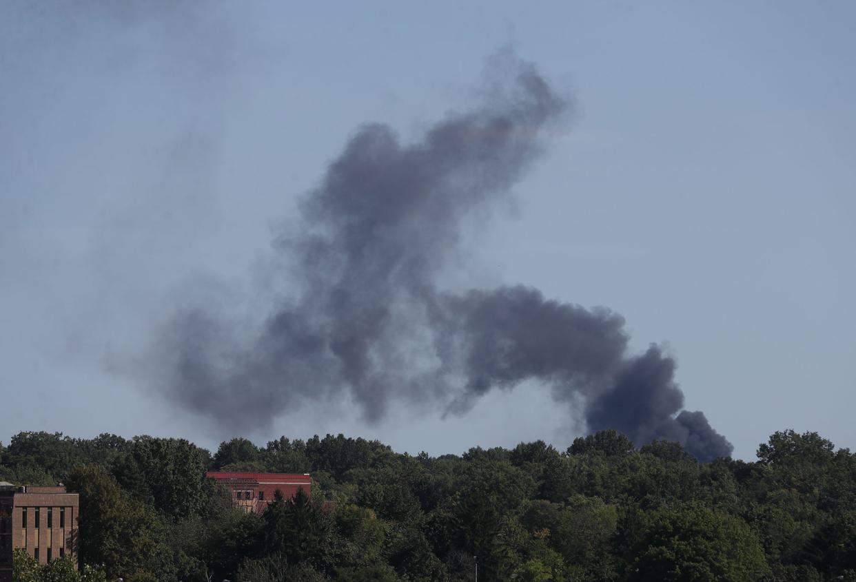 Thick black smoke is seen from S. Main Street in downtown Akron from a hazmat situation at an industrial fire on Rosemary Blvd in Akron on Thursday, Sept. 4, 2024.