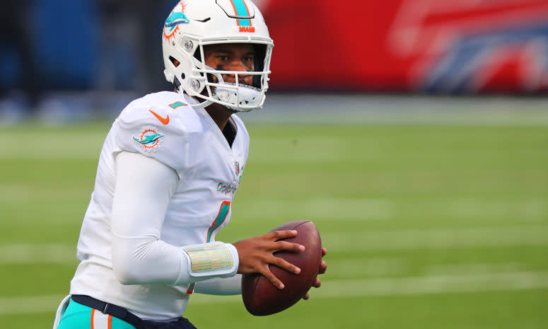 Tua Tagovailoa looks to pass for the Dolphins.
