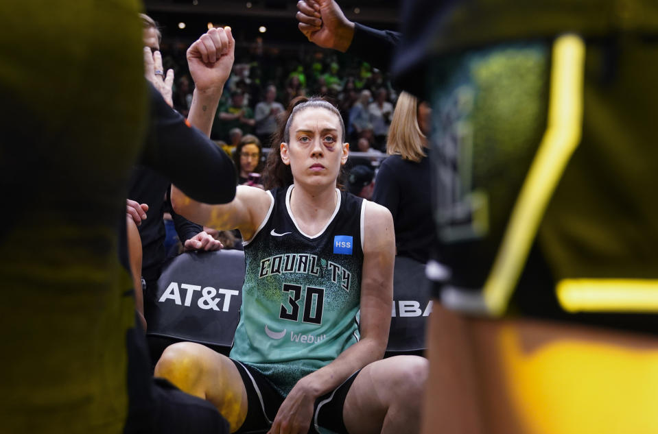 New York Liberty forward Breanna Stewart (30) sits on the bench before the team's WNBA basketball game against her former team, the Seattle Storm, Tuesday, May 30, 2023, in Seattle. (AP Photo/Lindsey Wasson)