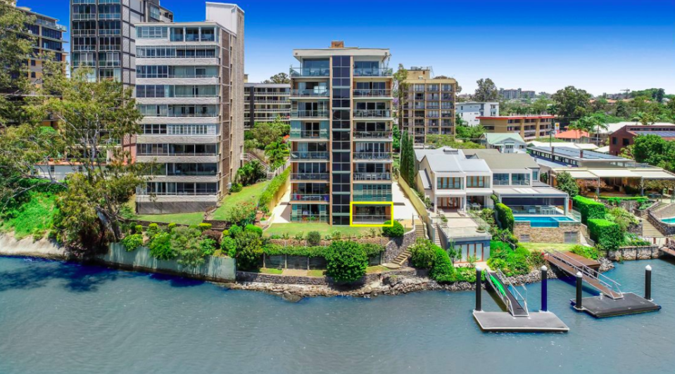 Brisbane real estate agency Ray White has been caught out appearing to Photoshop the Brisbane River in apartment photos.