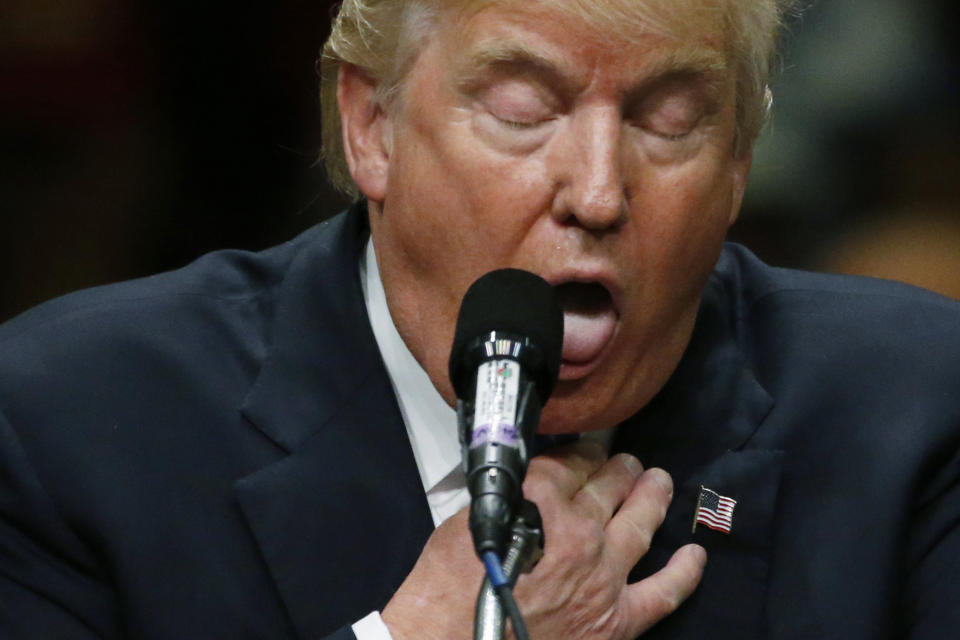 Republican presidential candidate Donald Trump refers to former Republican presidential nominee Mitt Romney, who lost the 2012 presidential election, as a "choker" at a rally with supporters in Anaheim, California, May 25, 2016.