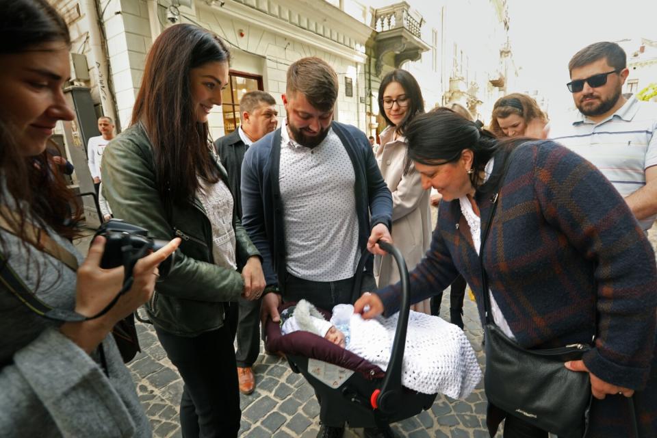 Born in Poland due to the war, baby Mativii is baptized at Saints Peter and Paul Garrison Church.