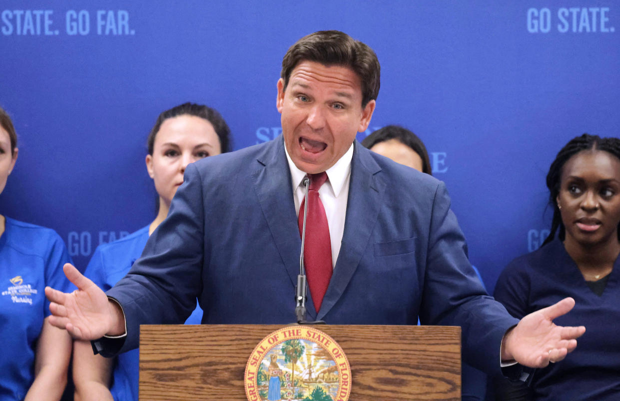 Florida Gov. Ron DeSantis answers questions during a press conference at Seminole State College in Sanford, Florida, Monday, May 16, 2022. DeSantis, at the school to announce $125 million in funding for nursing education, said the state will likely take over Disney World's Reedy Creek Improvement District, rather than local governments absorbing it, after he signed a bill dissolving the longtime special tax district in April. (Joe Burbank/Orlando Sentinel/Tribune News Service via Getty Images)