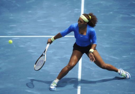 American Serena Williams returns a ball to Czech Lucie Hradecka during their semi-final match of the Madrid Masters. Williams won 7-6, 6-0