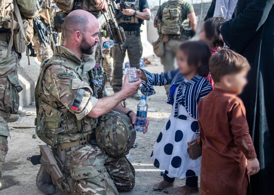 Lt Cdr Alex Pelham Burns, a member of the UK Armed Forces during the evacuation of entitled personnel from Kabul airport (Ministry of Defence/PA) (PA Media)