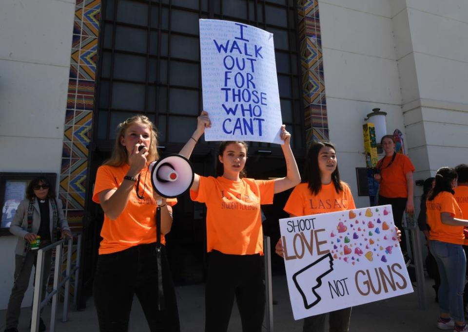 Students in Santa Monica, California, participate in the National School Walkout for Gun Violence Prevention in 2018. The walkout was organized by students at Marjory Stoneman Douglas High School in Parkland, Florida, where 17 people were killed in a mass shooting. (Photo by MARK RALSTON/AFP via Getty Images)