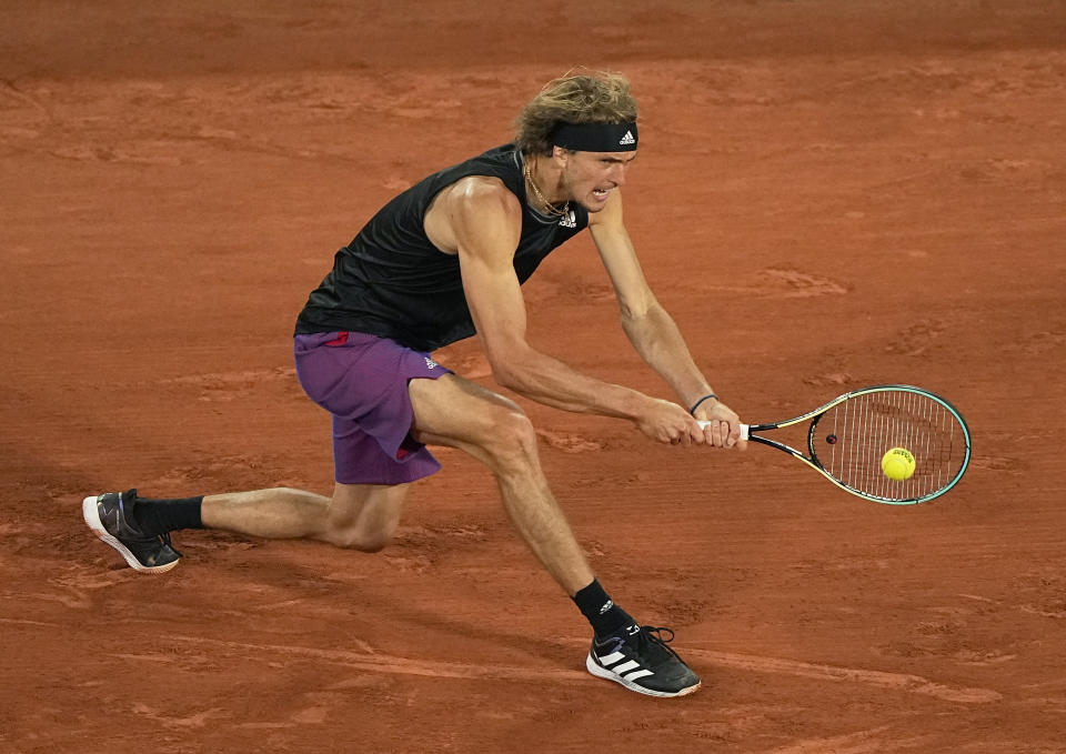 Germany's Alexander Zverev plays a return to Japan's Kei Nishikori during their fourth round match on day 8, of the French Open tennis tournament at Roland Garros in Paris, France, Sunday, June 6, 2021. (AP Photo/Michel Euler)