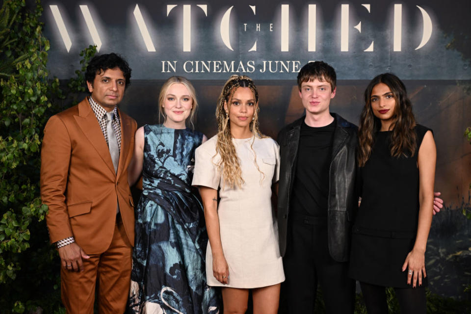 LONDON, ENGLAND - MAY 28: M. Night Shyamalan, Dakota Fanning, Georgina Campbell, Oliver Finnegan and Director, Ishana Shyamalan attend a special preview screening of “The Watched” at Ham Yard Hotel on May 28, 2024 in London, England. The Watched is released in UK and Ireland cinemas on the 7th June. (Photo by Jeff Spicer/Getty Images for Warner Bros)