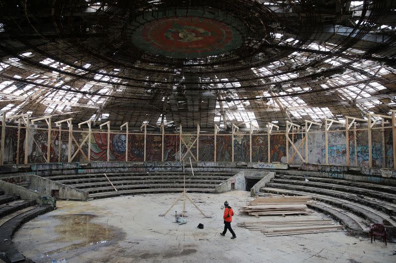 Man walks inside the Buzludzha monument in Stara Planina mountain