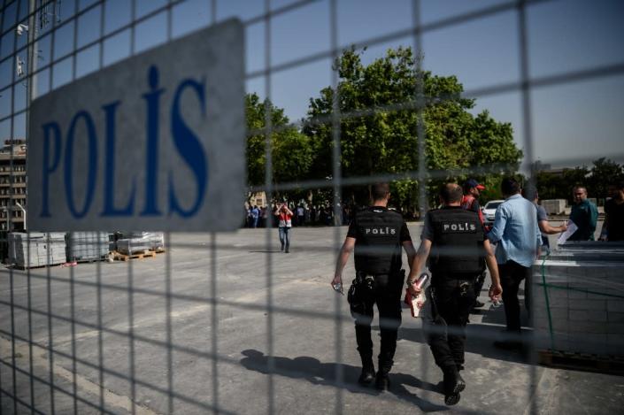 Turkish authorities have suspended more than 12,000 police officers over alleged links to Muslim cleric Fethullah Gulen (AFP Photo/Ozan Kose)