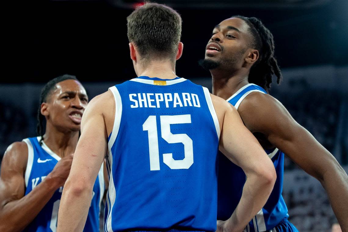 Kentucky guard Reed Sheppard is congratulated by Rob Dillingham, left, and Antonio Reeves after scoring in the Wildcats’ win at Mississippi State last month.