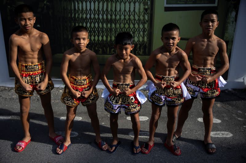 The Wider Image: Punching out of poverty: Despite risks, nine-year-old Thai fighter eager to return to ring