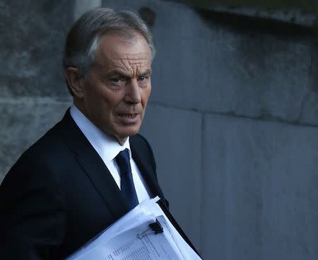 Britain's Former Prime Minister Tony Blair leaves the Houses of Parliament in London January 13, 2015. Blair was called to give evidence to the Northern Ireland Select Committee. REUTERS/Suzanne Plunkett