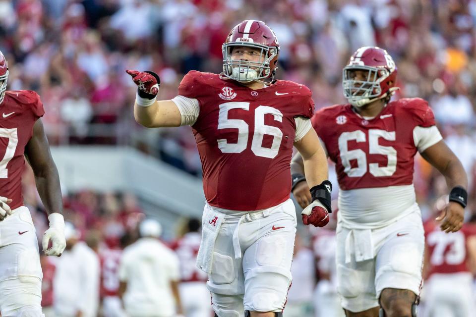 FILE - Alabama center Seth McLaughlin (56) takes the field against Tennessee during the second half of an NCAA college football game, Saturday, Oct. 21, 2023, in Tuscaloosa, Ala. Alabama center Seth McLaughlin, who had several errant snaps against Michigan in the College Football Playoffs, has entered the transfer portal, Wednesday, Jan. 3, 2024.(AP Photo/Vasha Hunt, File)