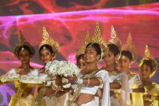 Twin dancers perform at the event, which was overwhelmed by the unexpectedly large turnout