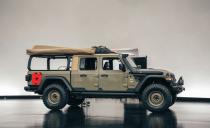<p>Good old-fashioned camping is so . . . out. Glamping and overlanding are very in these days. <a href="https://www.caranddriver.com/news/a27062557/jeep-wayout-concept-2019-moab-easter-jeep-safari/" rel="nofollow noopener" target="_blank" data-ylk="slk:Jeep's Wayout concept;elm:context_link;itc:0;sec:content-canvas" class="link ">Jeep's Wayout concept</a> aims at the latter. A Gladiator pickup isn't a bad starting point for an overlanding vehicle, and Jeep outfits the Wayout with a roof-mounted pop-up tent, a fold-out awning, and a storage system in the bed for taking the good life to the great outdoors. </p>