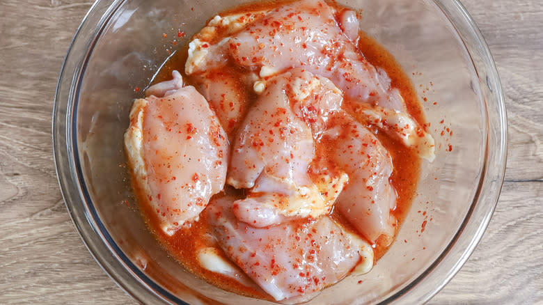 chicken thighs in red marinade