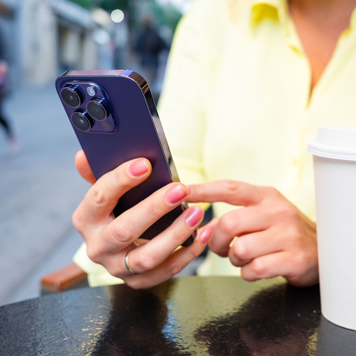 woman-texting-purple-iphone