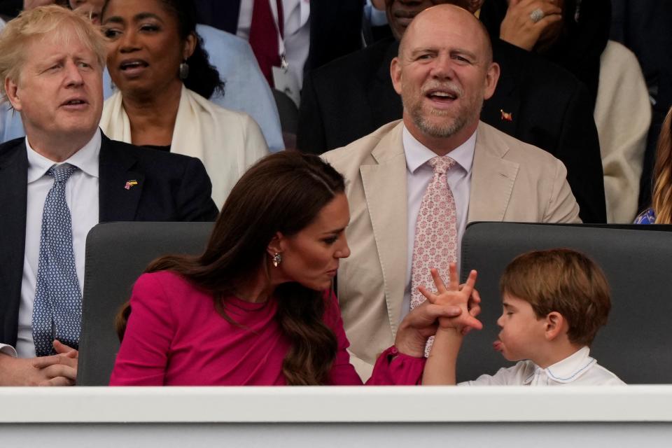 Prince Louis pulls a silly face at his mother, the Duchess of Cambridge, at the Platinum Jubilee Pageant (REUTERS)