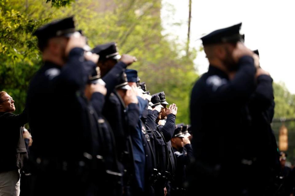Law officers line up for the processional of Charlotte-Mecklenburg Police Officer Eyer on Friday to First Baptist Church on Friday, May3, 2024. Officer Eyer was killed while serving a warrant in east Charlotte on Monday, April 29, 2024